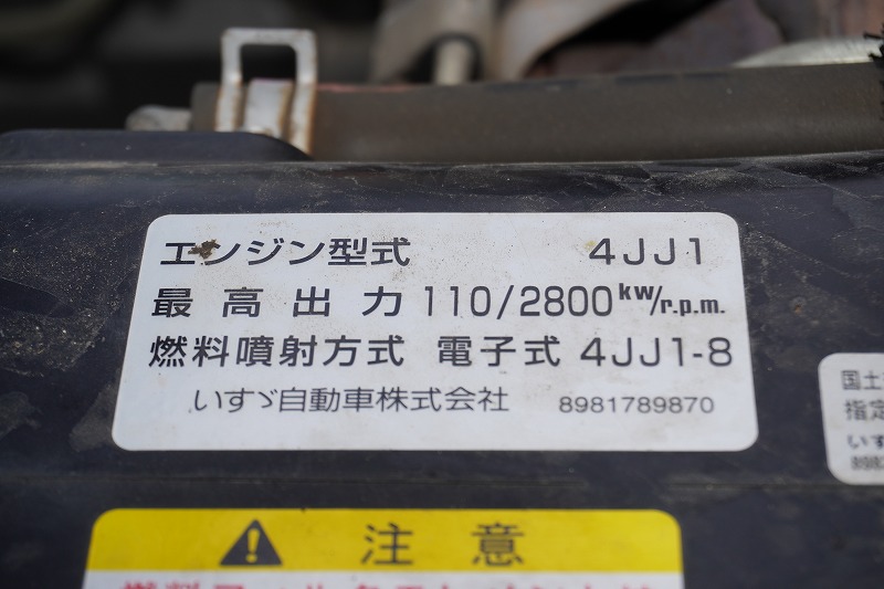 エルフ　高所作業車　アイチ製（ＳＨ１０Ａ）　積載１００ｋｇ　最大地上高９．９ｍ　ＦＲＰバケット　ブーム自動格納　バケット積載荷重２００ｋｇ　ジョイスティックタイプ　アワーメーター：２０１８ｈ　バックカメラ　社外ナビ　坂道発進補助　通信工事仕様！６速ＭＴ！11