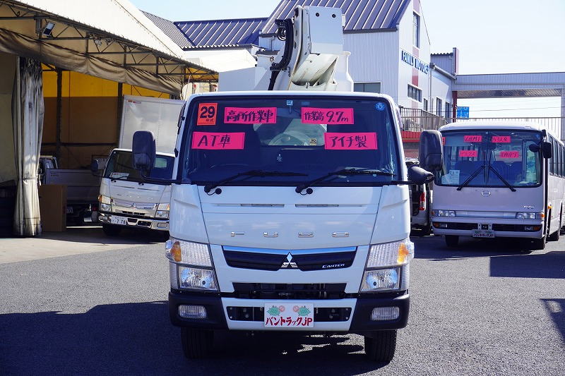 キャンター　高所作業車　アイチ製（ＳＢ１０Ａ）　最大地上高９．７ｍ　ＦＲＰバケット　バケット積載荷重２００ｋｇ　積載２５０ｋｇ　工具入れ　ジョイスティックタイプ　アワーメーター：４３３０ｈ　左電格ミラー　社外ナビ　バックカメラ　フォグランプ　通信工事仕様！ＡＴ車！0