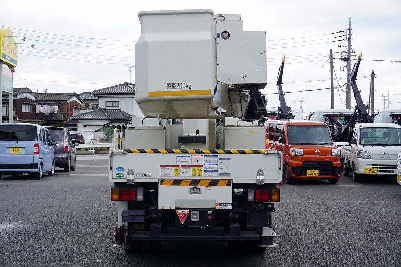 エルフ　高所作業車　タダノ製（ＡＴ－１００ＴＴ）　最大地上高９．９ｍ　ＦＲＰバケット　バケット積載荷重２００ｋｇ　積載５００ｋｇ　工具入れ　ジョイスティックタイプ　ブーム自動格納　ジャッキ自動張り出し　アワーメーター：１７５５ｈ　バックカメラ　坂道発進補助　左電格ミラー　通信工事仕様！６速ＭＴ！2