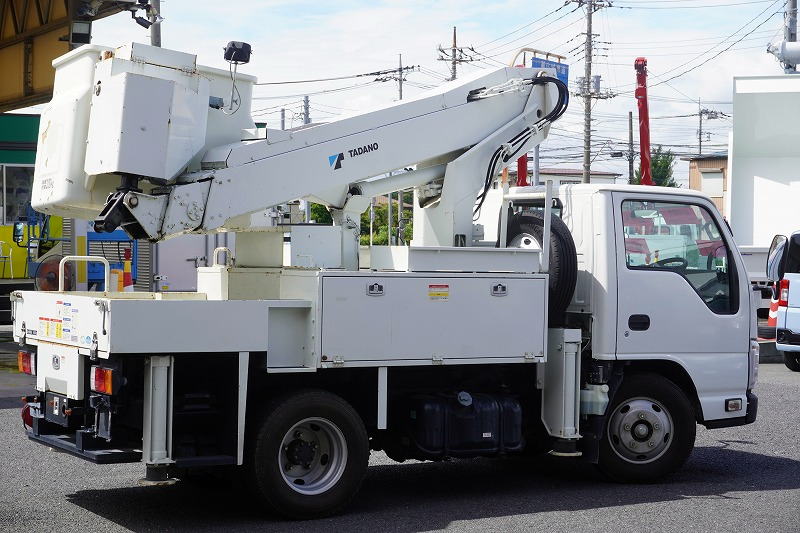 エルフ　高所作業車　タダノ製（ＡＴ－１００ＴＴ）　最大地上高９．９ｍ　ＦＲＰバケット　バケット積載荷重２００ｋｇ　積載５００ｋｇ　工具入れ　ジョイスティックタイプ　ブーム自動格納　ジャッキ自動張り出し　アワーメーター：１６５６ｈ　ＥＴＣ　坂道発進補助　左電格ミラー　通信工事仕様！６速ＭＴ！6