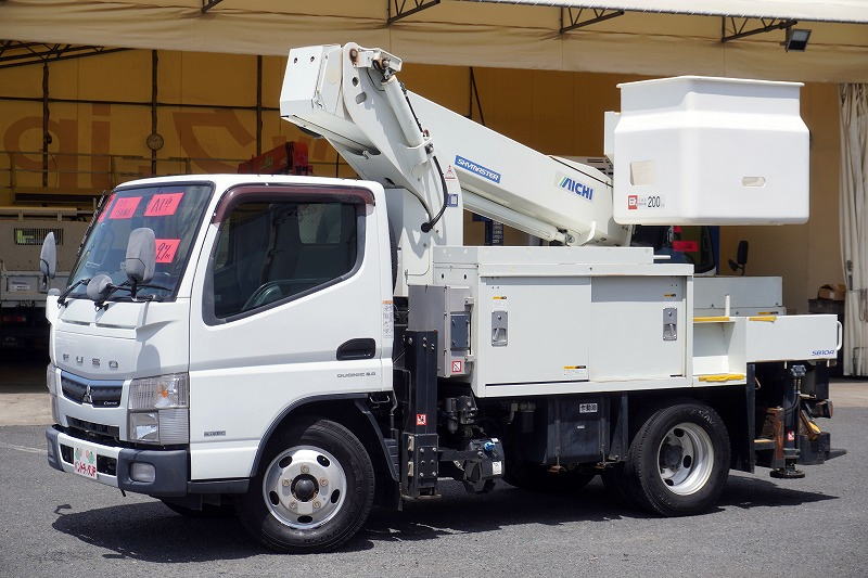 キャンター　高所作業車　アイチ製（ＳＢ１０Ａ）　最大地上高９．７ｍ　ＦＲＰバケット　バケット積載荷重２００ｋｇ　積載２５０ｋｇ　工具入れ　ジョイスティックタイプ　アワーメーター：４５４０ｈ　左電格ミラー　社外ナビ　バックカメラ　フォグランプ　通信工事仕様！ＡＴ車！フロント画像