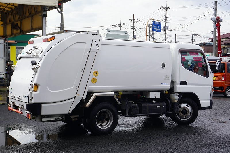 キャンター　「標準幅」　パッカー車　巻き込み式　積載２７５０ｋｇ　新明和製　５．１立米　排出ダンプアップ式　バックカメラ　ＥＴＣ　汚水タンク　５速ＭＴ！　U-02696